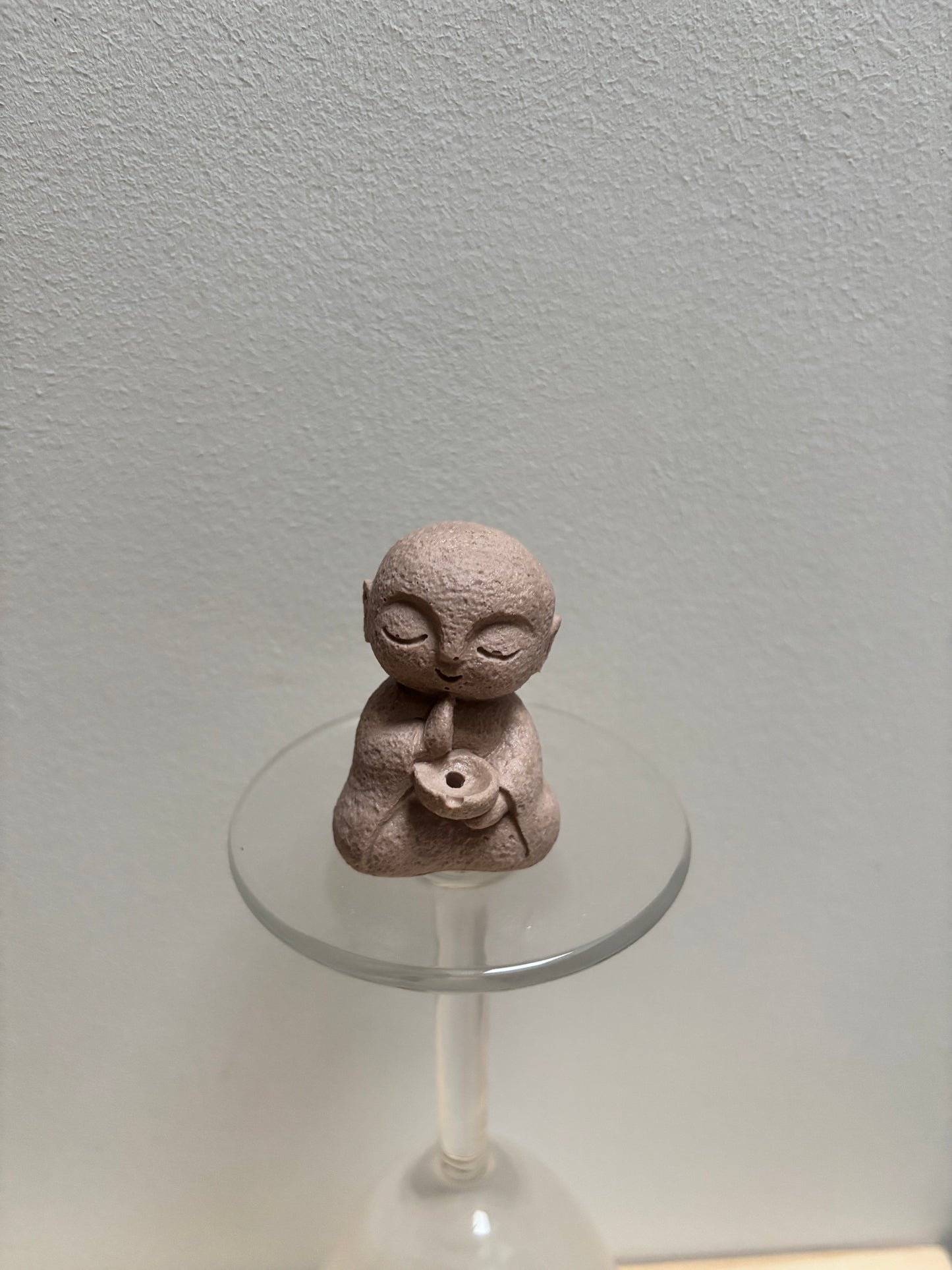 Bouddha porte encens