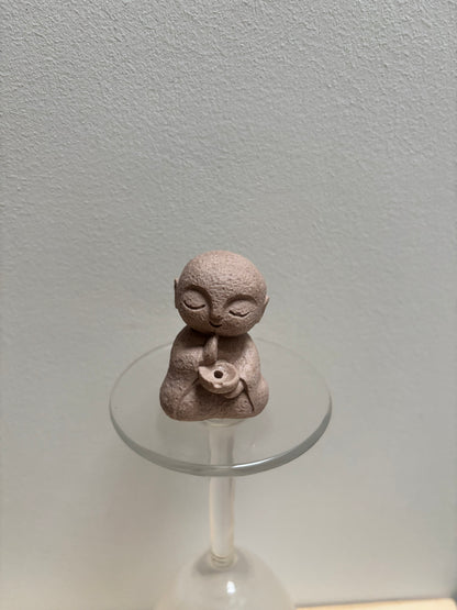 Bouddha porte encens