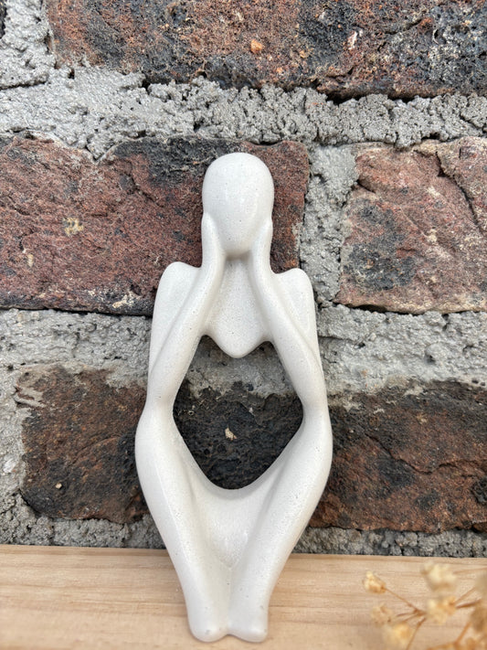Statues femme " joue "